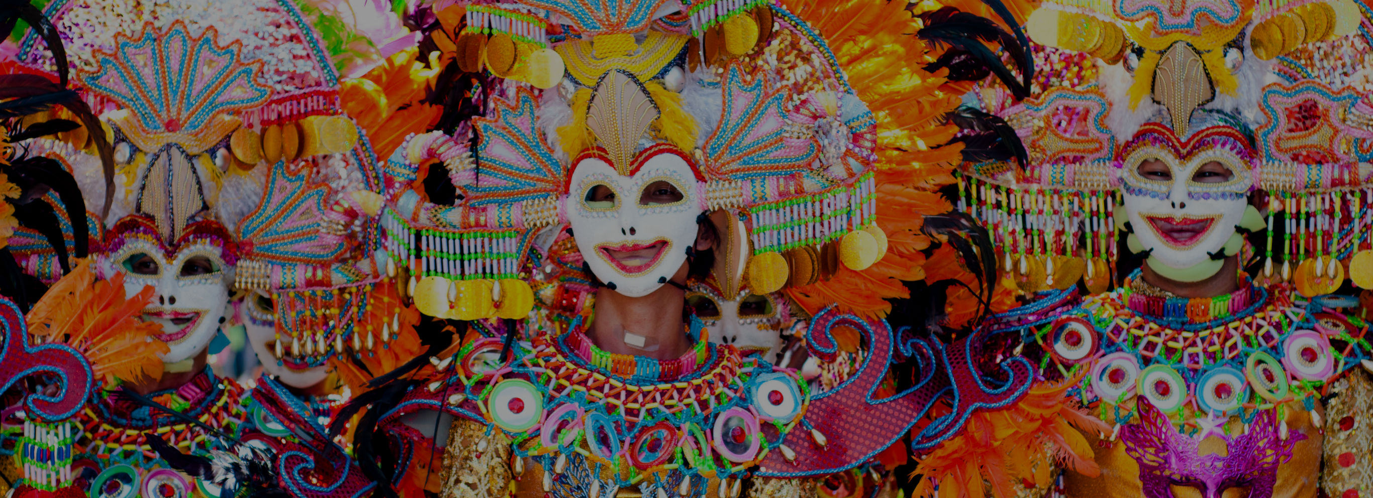 Parade of colorful smiling mask at Masskara Festival, Bacolod City, Philippines